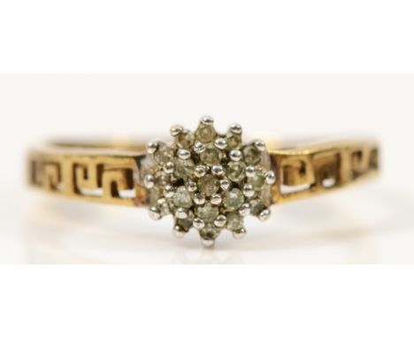 A 9ct gold diamond cluster ring with cut out detail to the shoulders, N, 1.5g