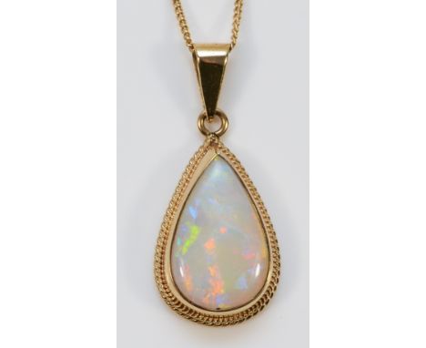 A 9ct gold opal pendant with a chain, crack to the left corner more visible from the back, 15mm x 10mm opal, 3.5g