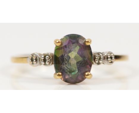A 9ct gold mystic topaz solitaire ring with diamond set shoulders, T, 2.2g