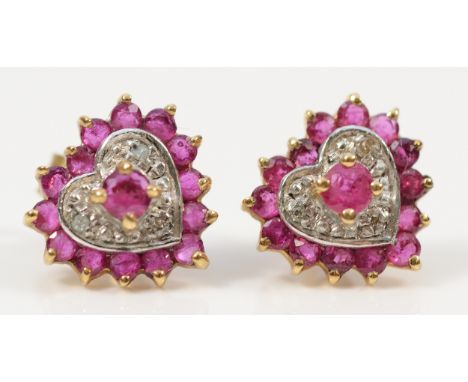 A pair of 9ct gold ruby and diamond heart cluster earrings with scroll backs, 1.7g
