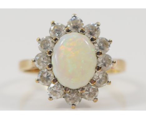 A 9ct gold opal and white gemstone cluster ring, Q, 3.7g