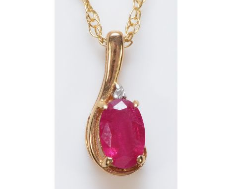 A 9ct gold ruby and diamond pendant with a chain, broken,1.2g