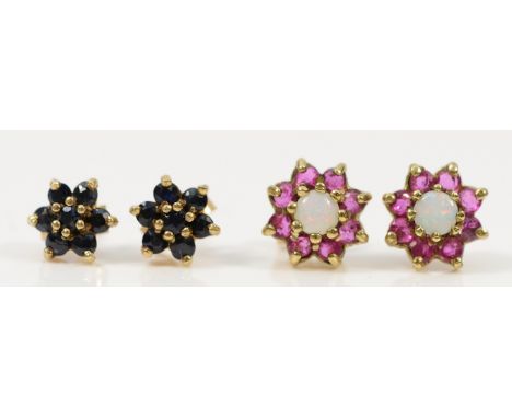 A pair of 9ct gold opal and ruby floral cluster earrings with scroll backs, together with a pair of 9ct gold sapphire floral 
