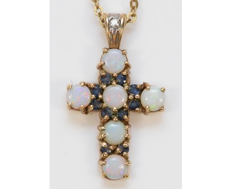 A 9ct gold opal, sapphire and diamond cross pendant with a chain, 20mm, 3g