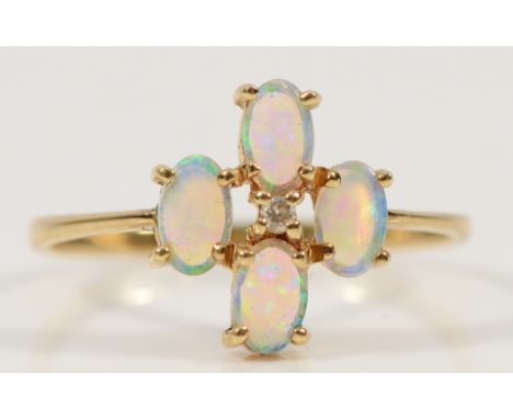 A 9ct gold opal and diamond dress ring, N 1/2, 1.1g