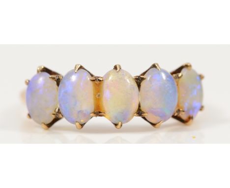 A 9ct gold opal five stone dress ring, L, 1.7g