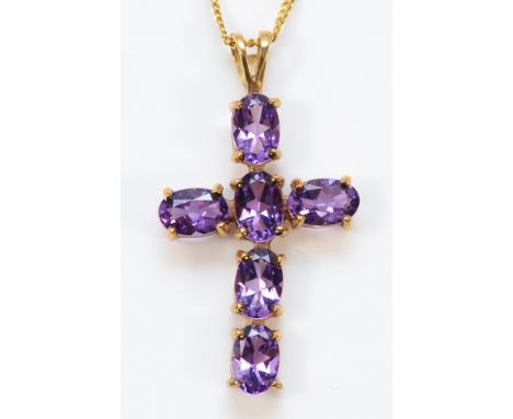 A 9ct gold amethyst cross pendant with a chain, 25mm, 2.9g