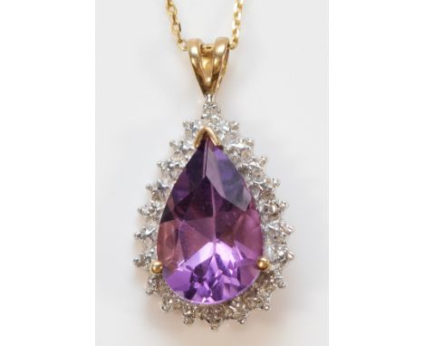 A 9ct gold amethyst and diamond cluster pendant with a chain, 13mm x 10mm amethyst, 3.3g