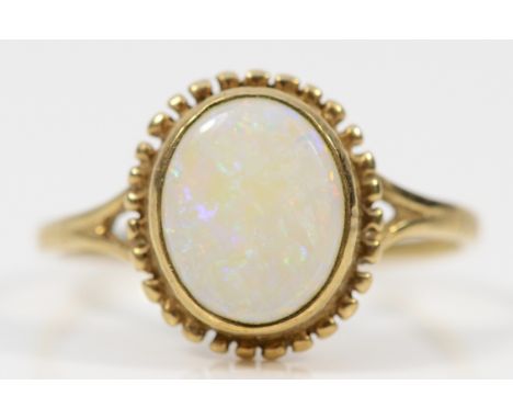 A 9ct gold opal cabochon dress ring, O, 2.1g