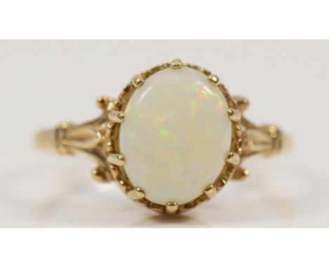 A 9ct gold opal solitaire ring, P, 1.9g