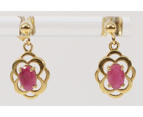 A pair of 9ct gold ruby drop earrings with scroll backs, 17mm drop, 1.4g
