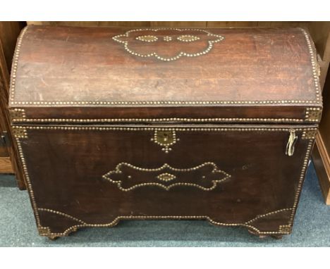 A domed top leather mounted trunk. Est. £30 - £50.