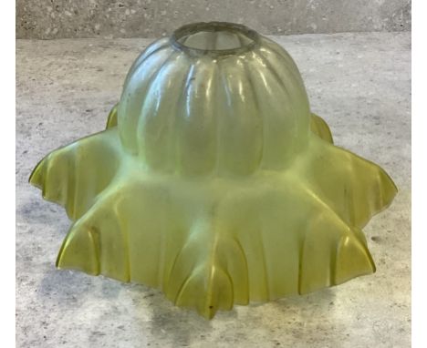 A small vintage French opaque glass lampshade in yellow / green. Approx. 17 cms diameter. Est. £20 - £30.