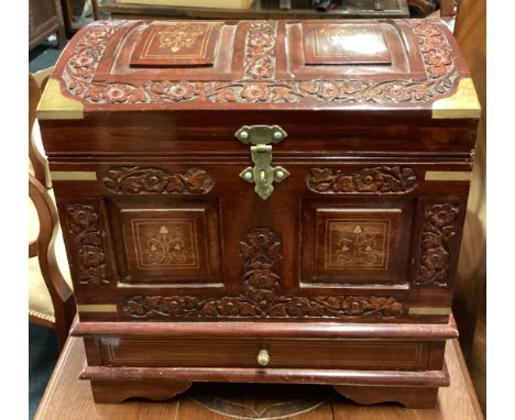 A 20th Century Continental domed top trunk. Est. £20 - £30.