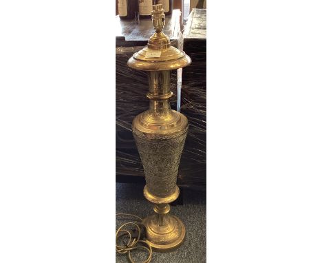 A large Eastern brass lamp. Est. £20 - £30. 