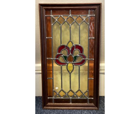 A wooden framed stained glass panel. Est. £20 - £30.