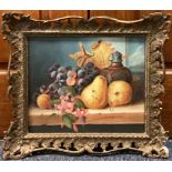 A framed oil on panel depicting a still life with fruit. Monogrammed EL to bottom right.
