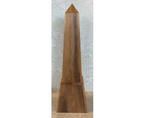 A tall carved wooden obelisk. Approx. 49 cms high. PROVENANCE: NOEL CHANAN. Est. £20 - £30.