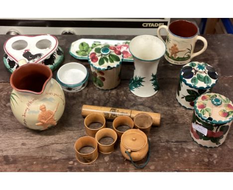 A collection of Wemyss pottery together with treen items. Est. £30 - £40.