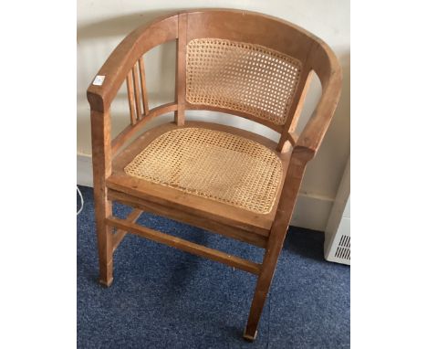 A cane seated button back chair. Est. £20 - £30.