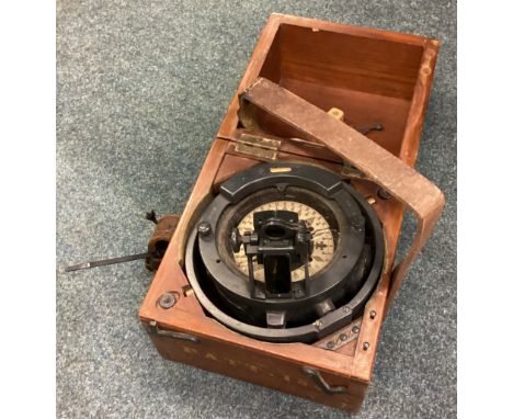 A cased mahogany Naval compass. Est. £50 - £80