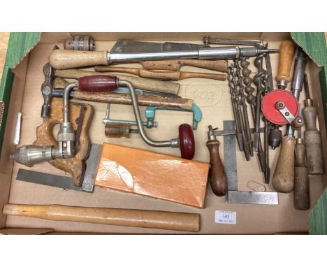 A box containing old woodworking tools. Est. £20 - £30.