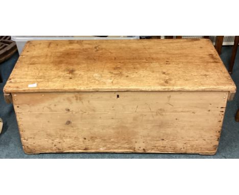 A good hinged top pine trunk. Est. £50 - £80.