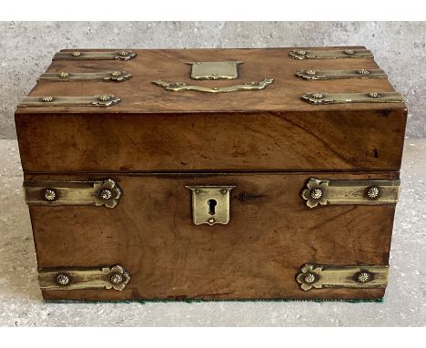 A brass mounted burr walnut tea caddy. Est. £30 - £50.