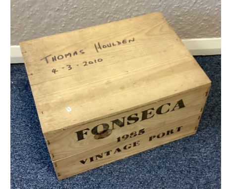 A sealed wooden boxed set of twelve x 75cl bottles of Fonseca Vintage Port 1985.