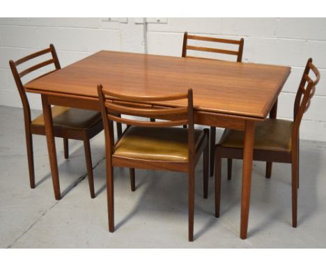 A retro G-Plan teak extending dining table and a set of four ladder back chairs (5).