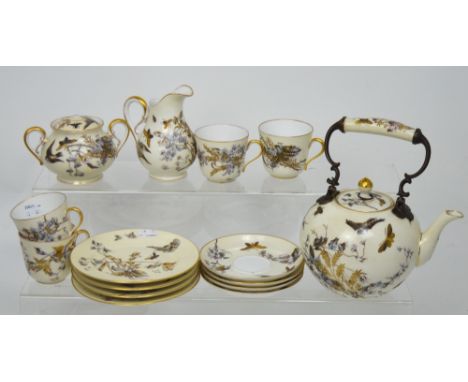 An early 20th century Continental fifteen piece tea service by Fischer & Mieg, comprising teapot, sucrier and four each of cu