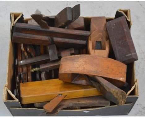 A quantity of vintage wooden planes, marking gauges etc.