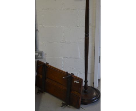 An oak turned standard lamp on a circular base and a vintage oak trouser press (2).