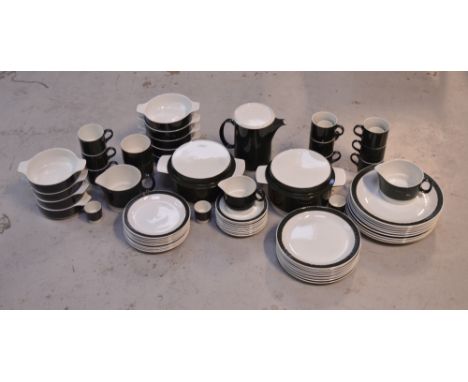 A quantity of retro Poole tea and dinnerware to include tureens, cups and saucers, dinner plates etc.