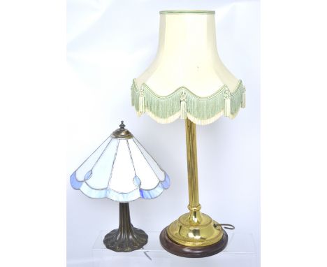 A brass-effect classical style column table lamp and a modern Art Deco style lamp with Tiffany style glass shade, height 55cm