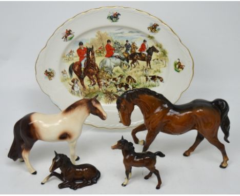 Two Beswick brown horses, a similar unmarked example of a seated horse, a Melbaware figure of a horse and a Broadhurst Brothe