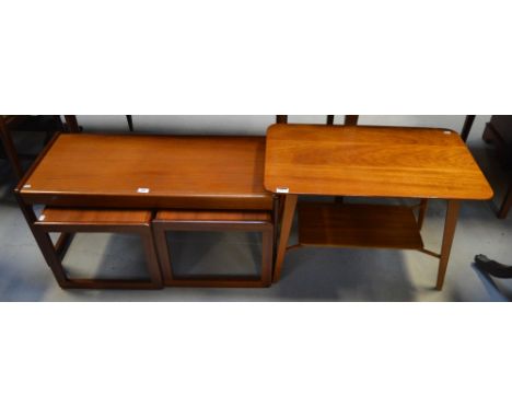 A retro G-Plan style nest of three tables, largest rectangular example width 96cm, a similar coffee table with lower tier, wi