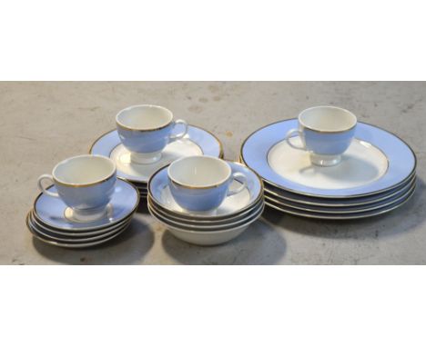 A small quantity of Royal Doulton blue ground and gilded dinnerware to include dinner plates, side plates, cups and saucers e