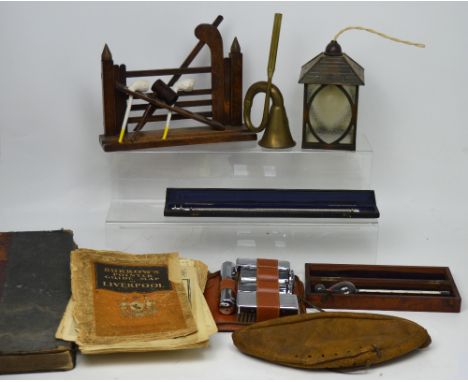 A collectors' lot to include a late Victorian handwritten ledger, a gate form oak pipe rack with a briar pipe and two clay pi