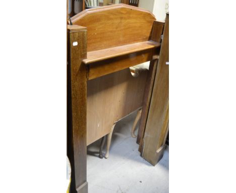 An Edwardian oak fire surround, Greek key decoration over lower shelf on plinth supports, 142 x 132cm.