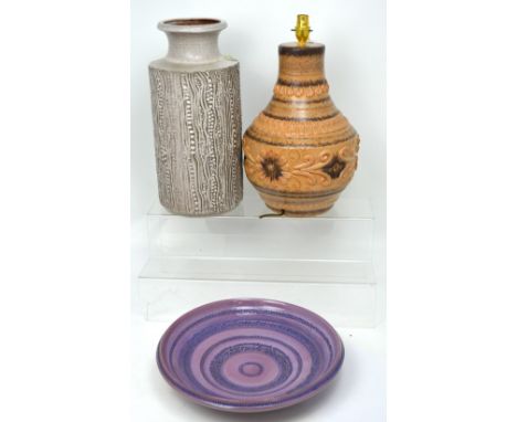 A large West German ceramic table lamp base, a large West German cylindrical floor vase and a West German glazed earthenware 