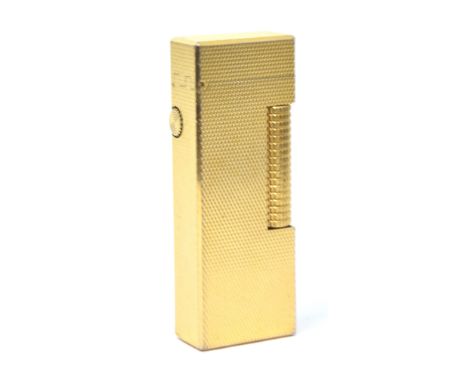 A gold plated Dunhill pocket lighter, unboxed.