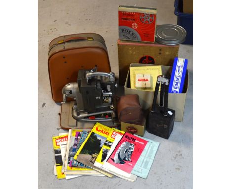 A cased Bolex Paillard M8 projector and a quantity of film and accessories, also a quantity of home movie publications, a Hun