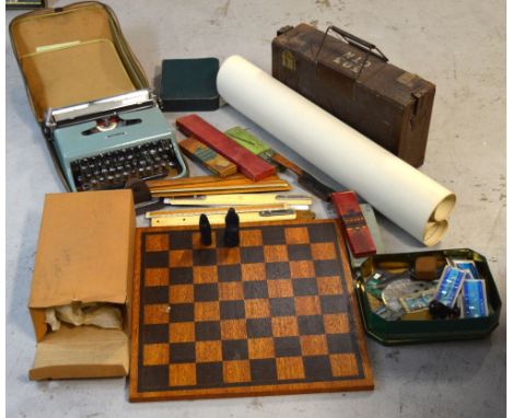 A collectors' lot comprising resin medieval style chess set and board, vintage stationery items to include rulers, a cased vi