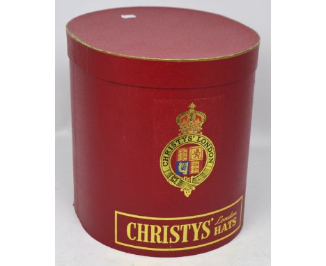 A Christys' London hat box in pillar box red.