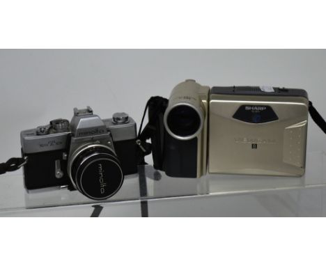 A Minolta cased camera and a Sharp Viewcam, various light meters etc.