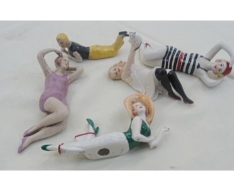Five ceramic bathing beauties.