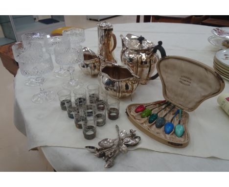 A 3-piece tea service: hot water jug, glasses cased coffee spoons, 10 tea cups, spoons