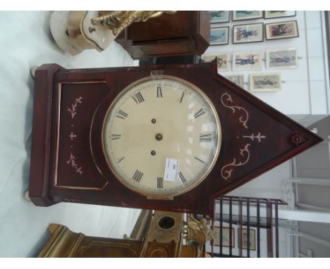 A 19th century bracket clock with a pitches top. The body is inlaid with metal motifs and brass side panels
