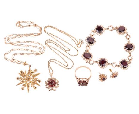An Edwardian seed pearl star pendant and a matched suite of garnet jewellery in 9ct gold; the pendant on chain of star form m